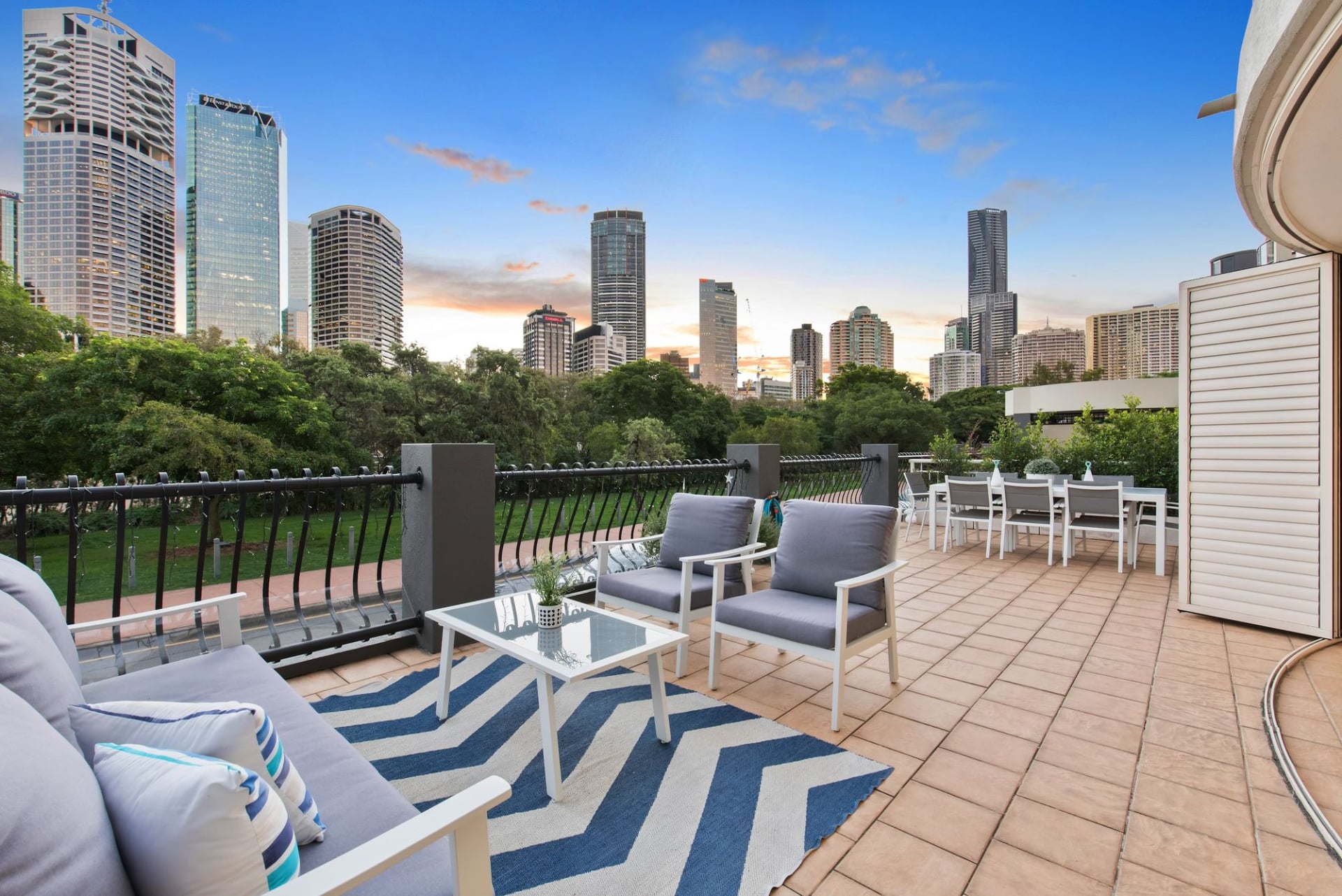 Outdoor seating with a view of a cityscape